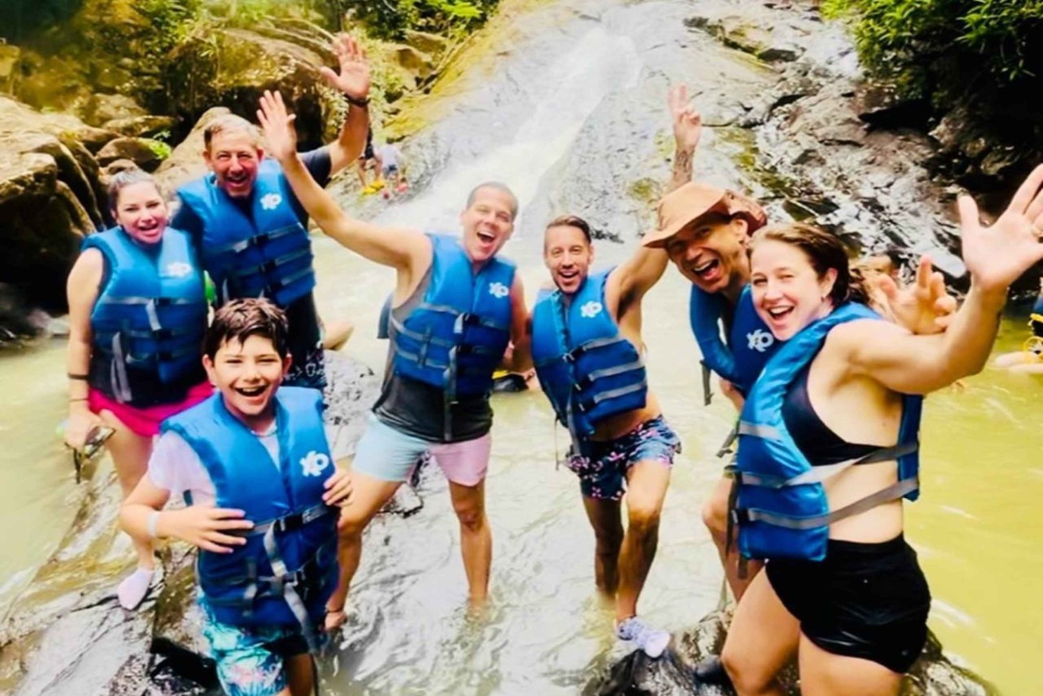 San Juan: Rainforest Waterslides & Beach Tour with Transport