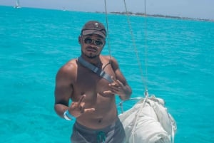 ¡Catamaran Adventure to Isla Mujeres! snorkel and food