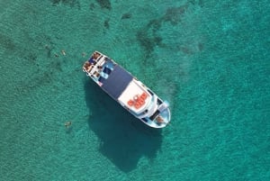 Paphos : Croisière au coucher du soleil sur le lagon bleu, barbecue et vin + toboggan aquatique