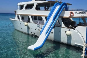 Protaras: Luxury Sunset Yacht Trip with Slide, BBQ & 1 Drink