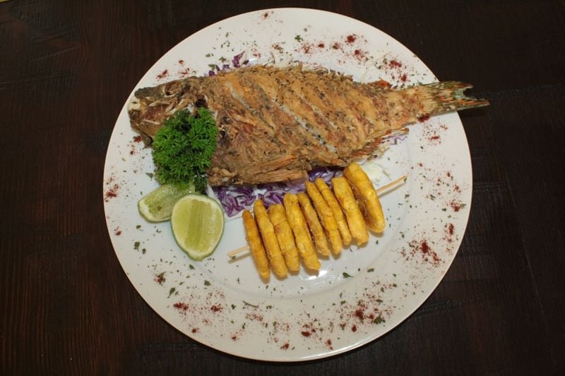 Fried fish Boca Chica style with Tostones