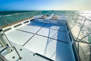 Punta Cana Bavaro: Private catamaran boat with snorkeling, open bar, and sailing