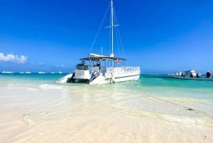 Punta Cana Bavaro: Private catamaran boat with snorkeling, open bar, and sailing