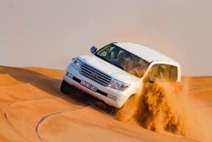 Da Dubai: tour nel deserto in 4x4 con grigliata e spettacoli