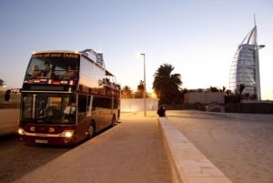 Dubai: Tour nocturno panorámico en autobús grande y cena en crucero opcional