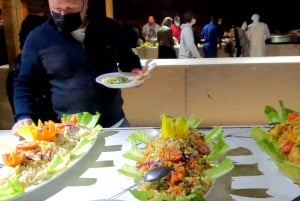 Dubaj: Pustynna przejażdżka na wielbłądzie z pokazami na żywo i kolacją w formie bufetu BBQ