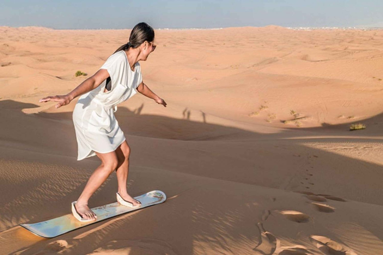 Dubai: Desert Ride, Camel Ride, Sandboard, & BBQ Dinner
