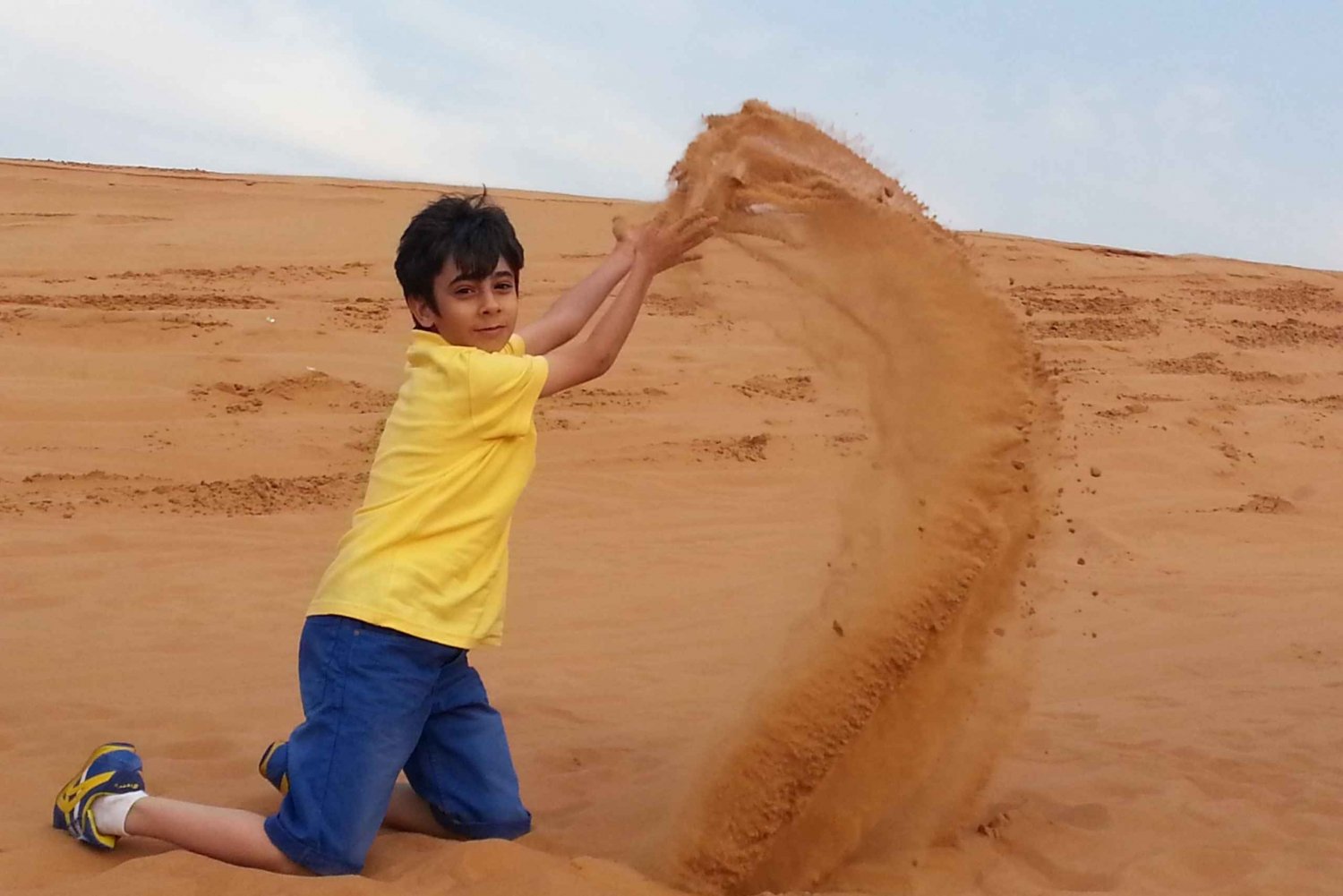 safari sulle dune rosse, giro in cammello, sandboarding e cena