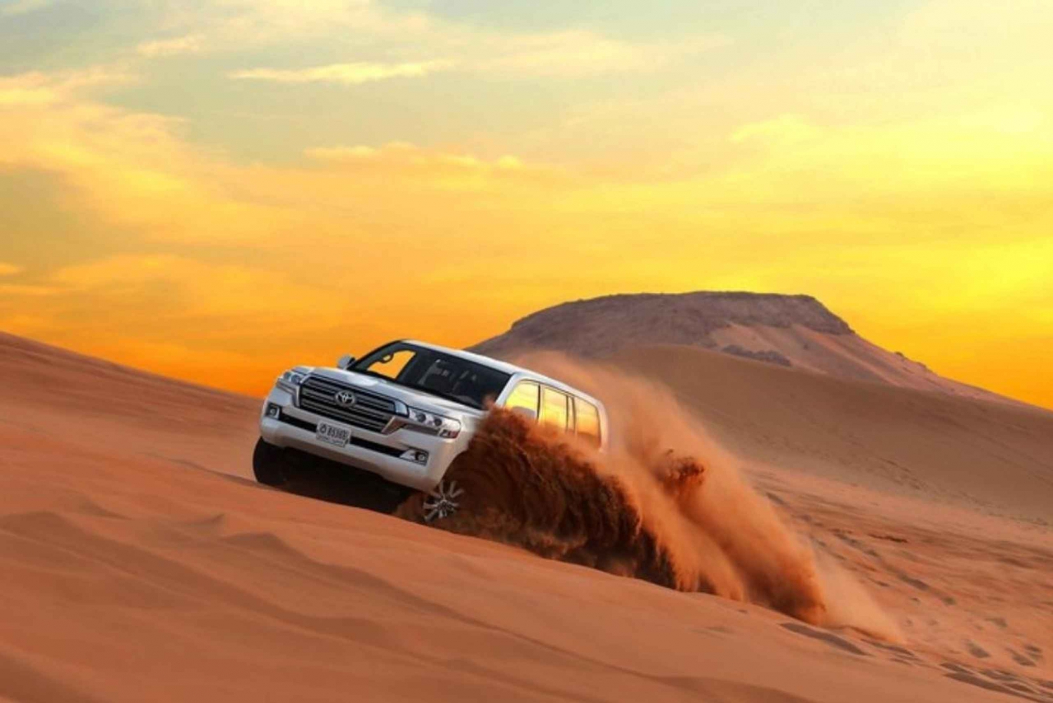 Dubai: Desert Tour, Dinner, Shows, Camel & Sandboard Drive
