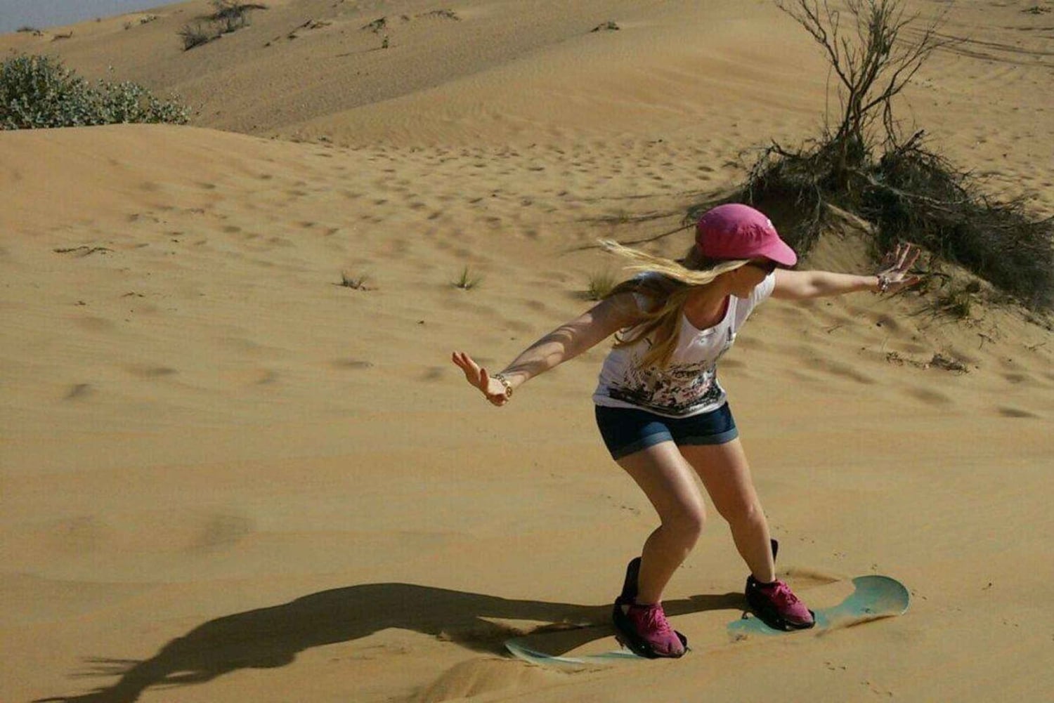 Dubai: Quad rijden in duinen, kamelen en zandboarden
