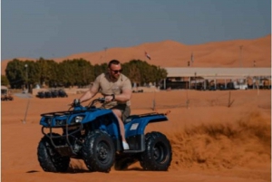 Dubaï : Excursion en soirée avec quad, promenade à dos de chameau et barbecue
