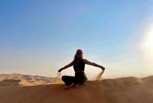 Dubai: Evening Tour with Quad Biking, Camel Ride, and BBQ