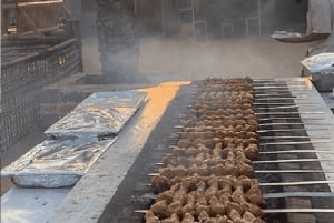 Dubai: Evening Tour with Quad Biking, Camel Ride, and BBQ