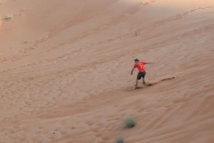 Dubai: Evening Tour with Quad Biking, Camel Ride, and BBQ