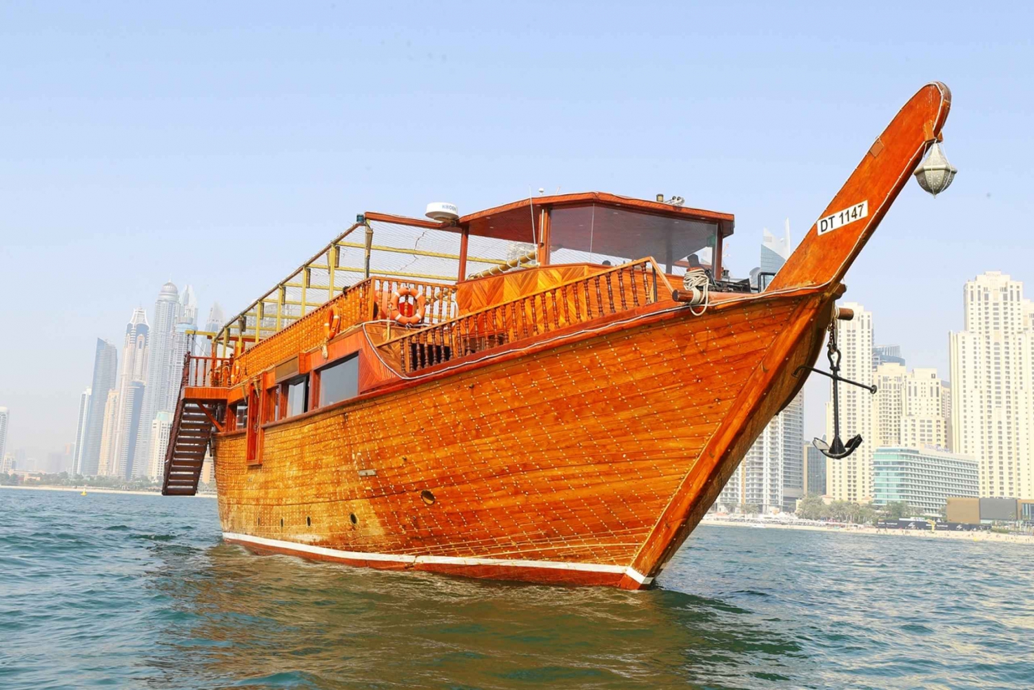 Dubai marina traditional wooden dhow dinner cruise