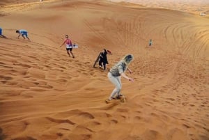 Dubai: Safari sulle dune rosse con quad, sandboard e cammelli