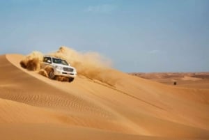 Dubaï : Dunes rouges : soirée en quad, saut de dunes avec barbecue