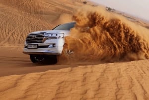 Dubaï : Dunes rouges : soirée en quad, saut de dunes avec barbecue