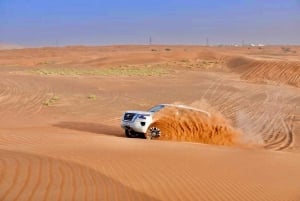 Dubaj: Poranny pustynny quad, buggy lub przejażdżka samochodem 4x4 na czerwonych wydmach
