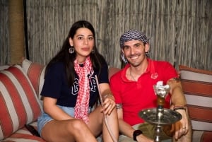 Dubaï : Les Dunes Rouges en Quad avec Sandboarding, Chameaux et BBQ