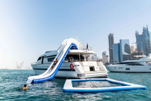 Dubai: Yacht Ride & Slide, Swim & Snorkel with BBQ Lunch