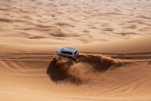 Safári no deserto de dunas vermelhas, quadriciclo, sandboard e passeio de camelo