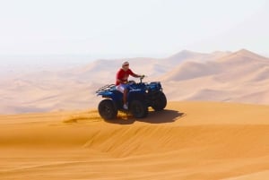 Safari dans le désert des dunes rouges, quad, sandboarding et balade à dos de chameau
