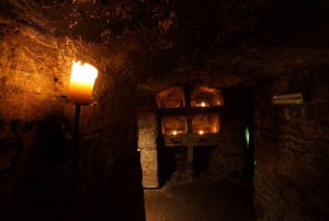 Explorez les voûtes souterraines lors d'une visite sur les fantômes avec du whisky