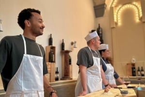 Florence: Flambé Cheese Wheel Truffle Pasta Class & Tiramisù