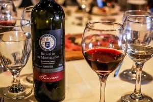 Firenze: Cena toscana, degustazione di vini con trasferimento privato
