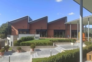 Privéchauffeur voor winkelen naar 'The Mall' en Prada Outlet