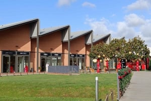 Privéchauffeur voor winkelen naar 'The Mall' en Prada Outlet