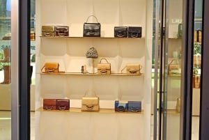 Privéchauffeur voor winkelen naar 'The Mall' en Prada Outlet