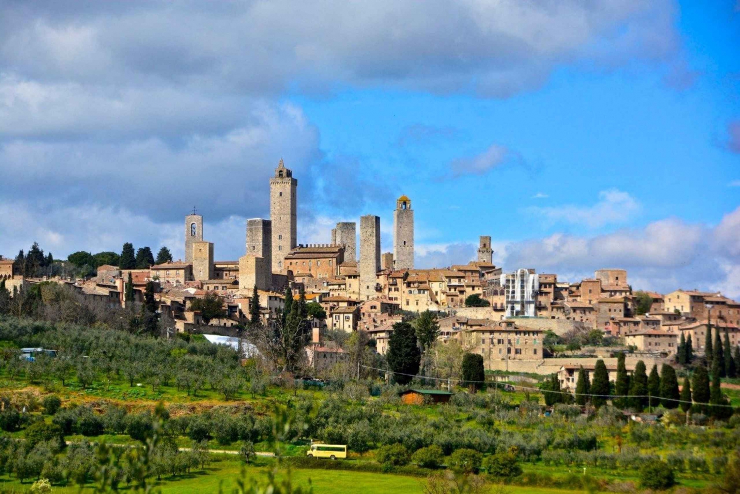 Visit Siena and San Gimignano with lunch at a family farm