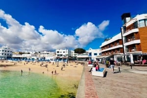 Corralejo : visite à pied avec boisson sur un toit au coucher du soleil