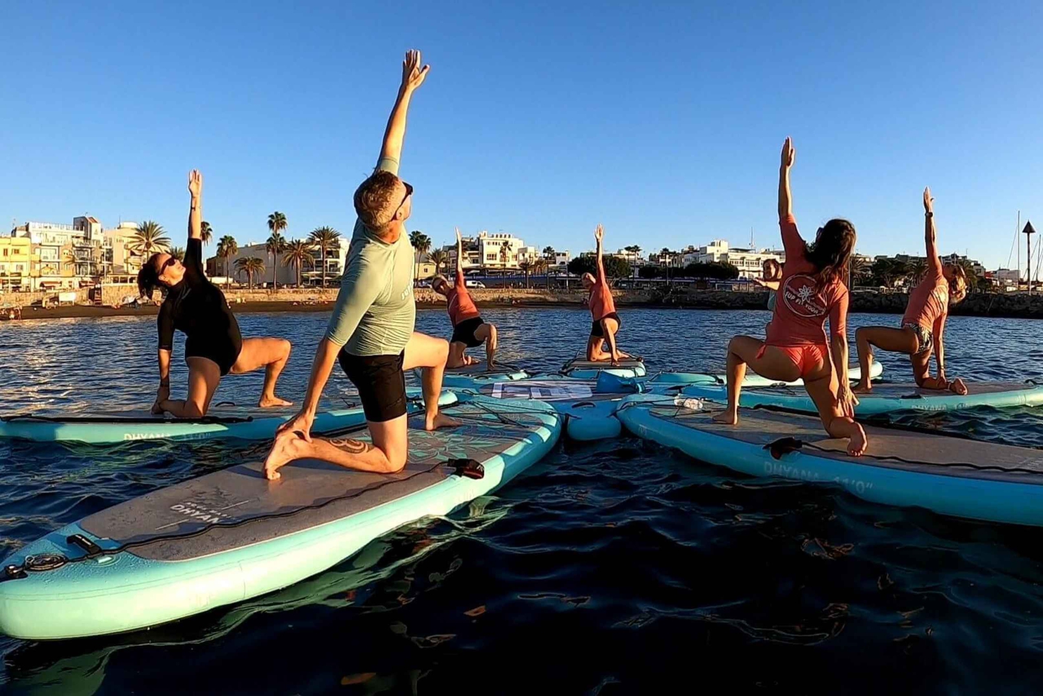 Arguineguín: Stand-up Paddleboard Yoga Class with Instructor