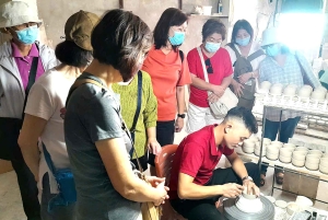 Exploration du village de Bat trang et des usines de céramique / guide région