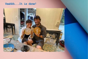 Hanoi: lakwerk en votiefpapier dorpen of wierook en hoed