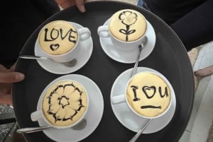 Tour gastronomico delle luci notturne di Hanoi in moto