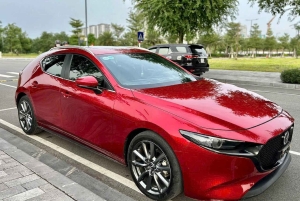 Hanoi: Transport til/fra Halong med privat bil