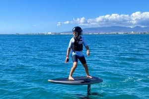Hawaï: Elektrische draagvleugelboot groepsles surfen