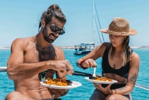 Ibiza: Bootsfahrt nach Formentera mit Open Bar & Paella