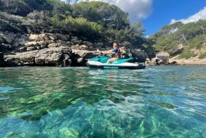 Santa Eulalia: Vannscootertur med valgfritt delfinsøk