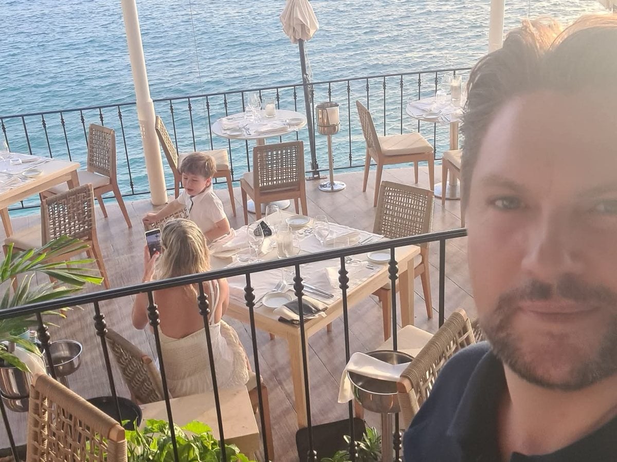 Mark at a seafront restaurant in Barbados