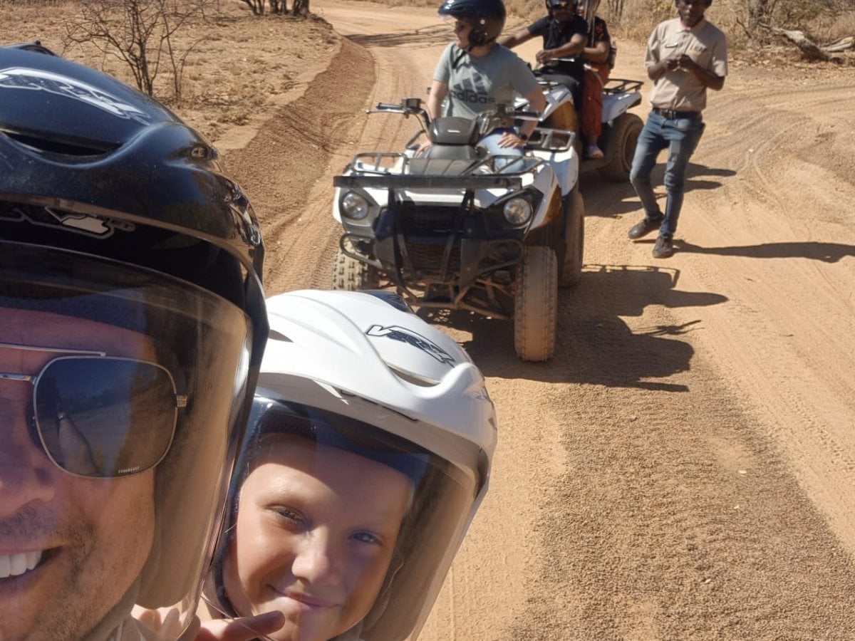 Mark and his daughter on a quad bike trail