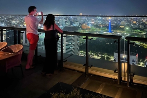 Jakarta: Night Walking Tour with Snacks and Dinner