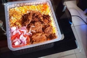 Aula de culinária suaíli e passeio pelo mercado local com passeio de tuk tuk