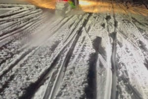 Desde Cracovia: Paseo Nocturno en Moto de Nieve por Zakopane, Hoguera,