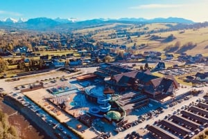 Krakow: Zakopane Snowmobiles, Bonfire & Hot Springs Day Tour