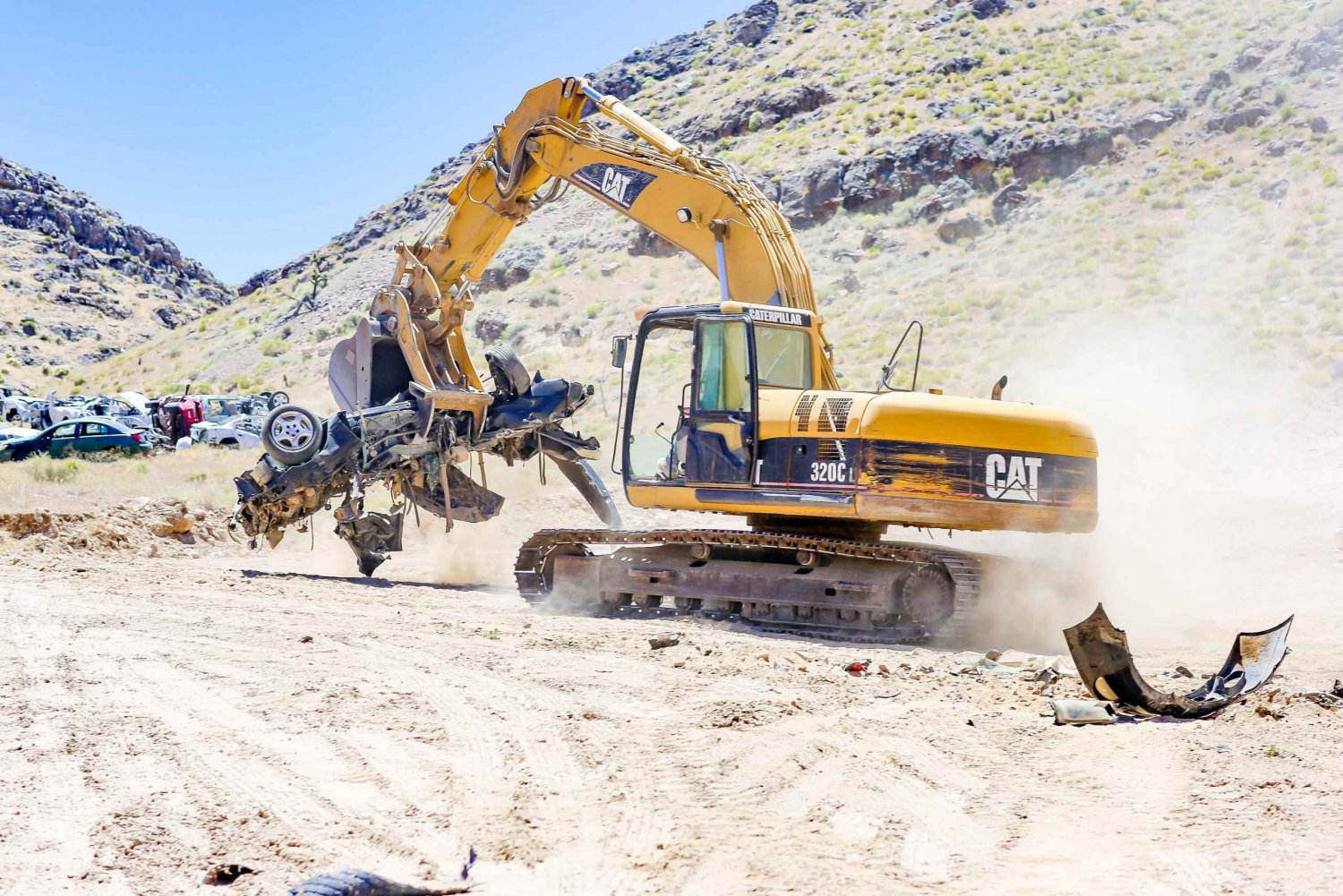 Aplastar y agarrar una excavadora